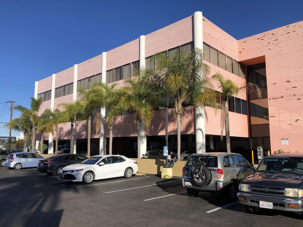 3930 original pink facade parking lot, KSW Construction Management