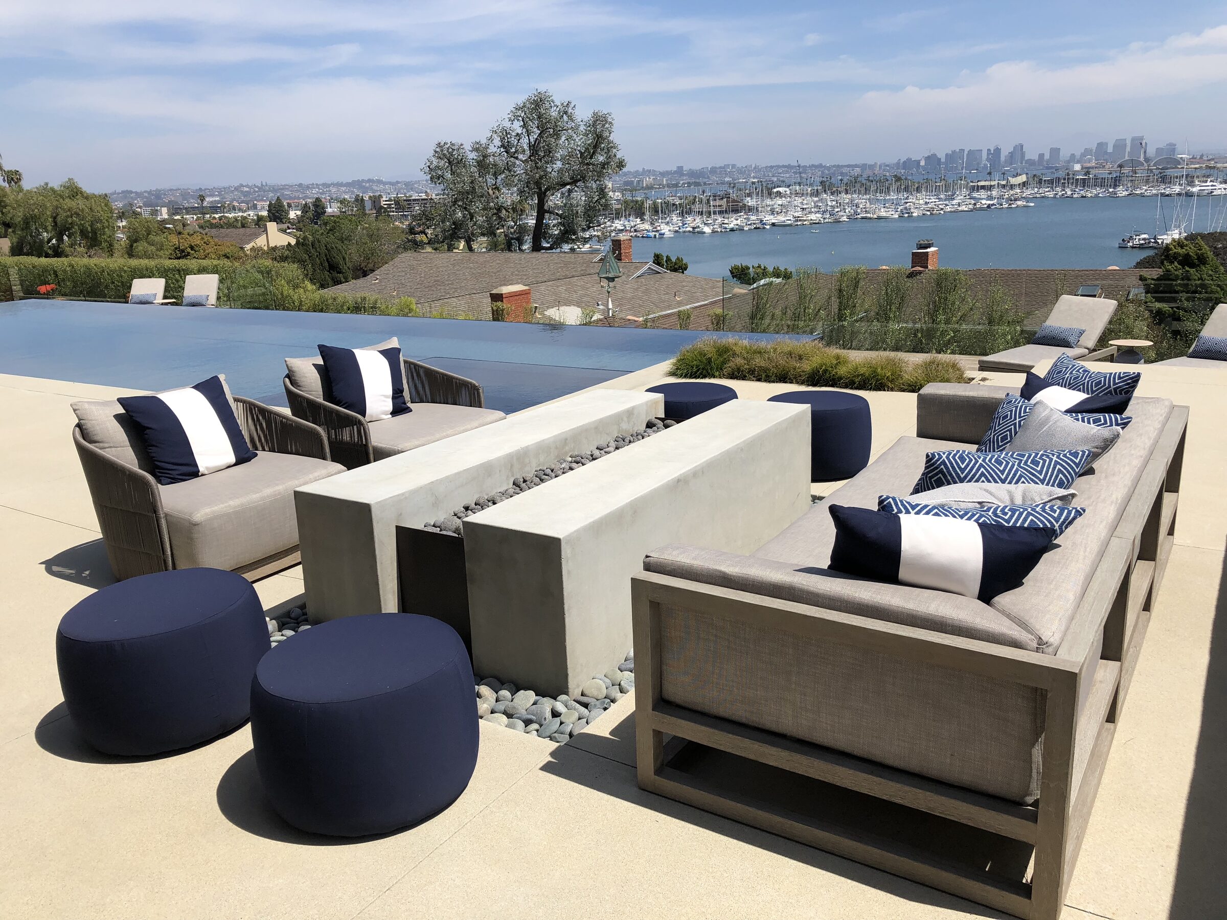 Luxury rooftop fire pit with harbor view