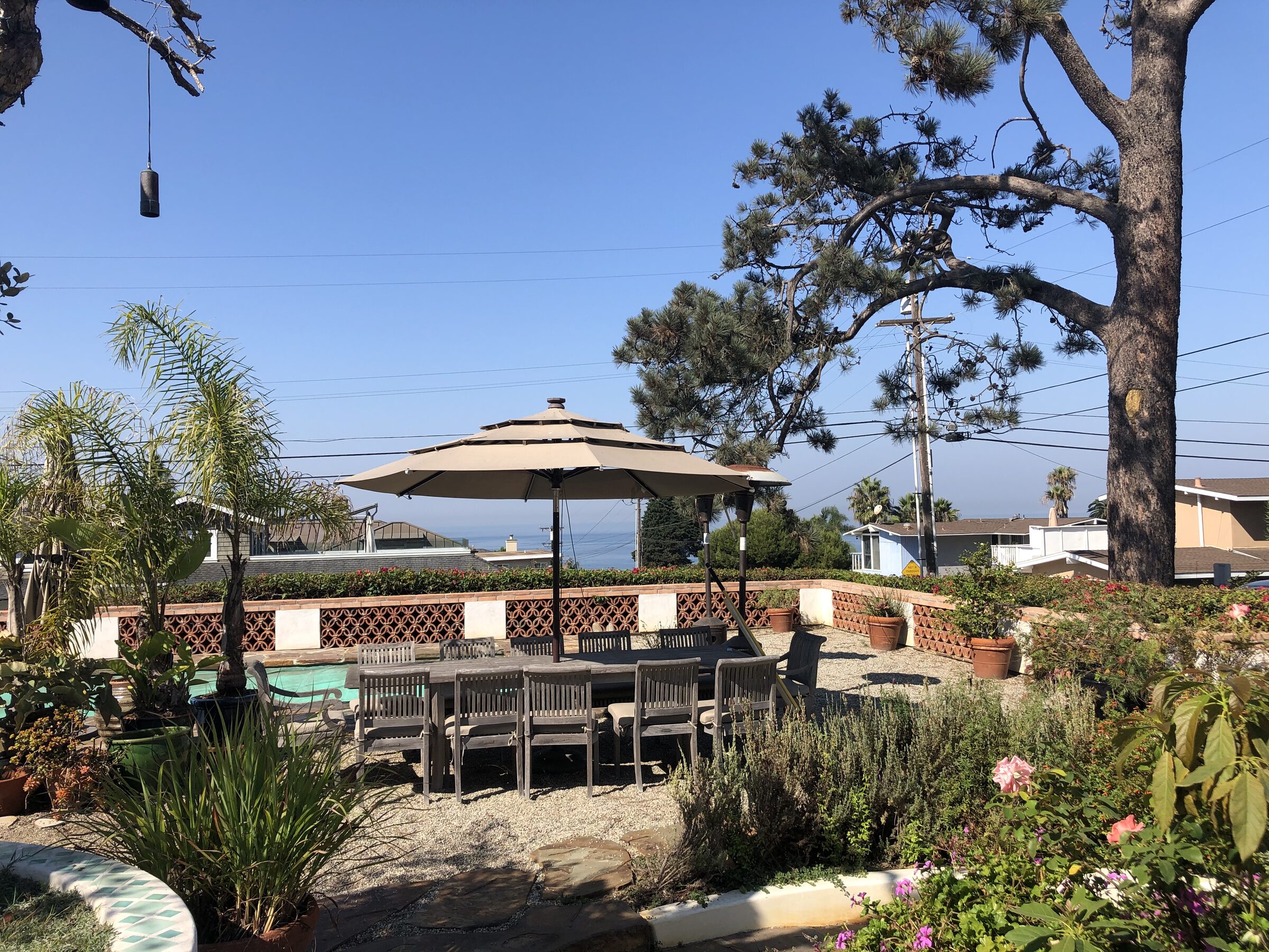 Patio dining area with ocean view