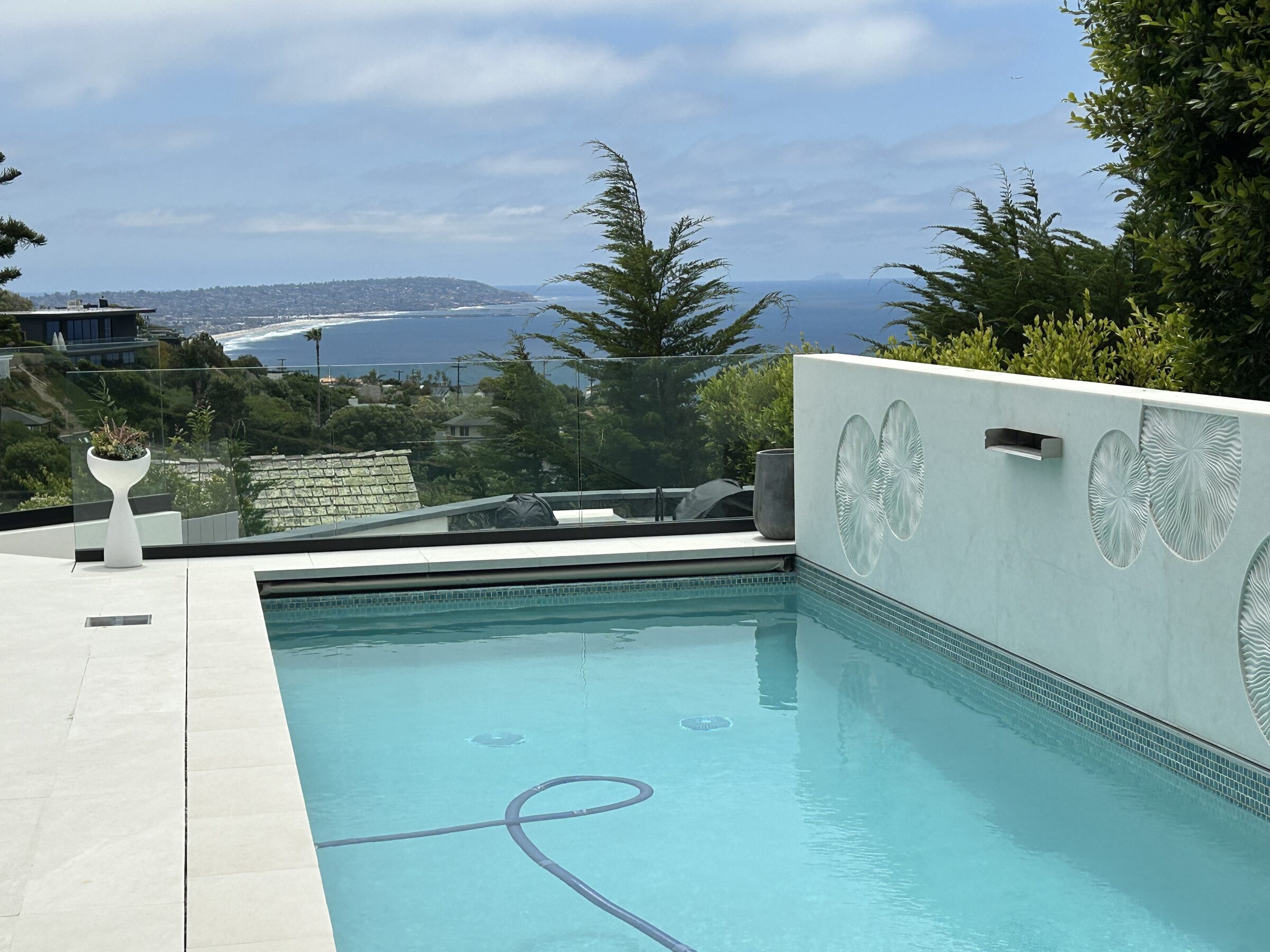 Pool scupper wall coastal view, KSW Construction Management