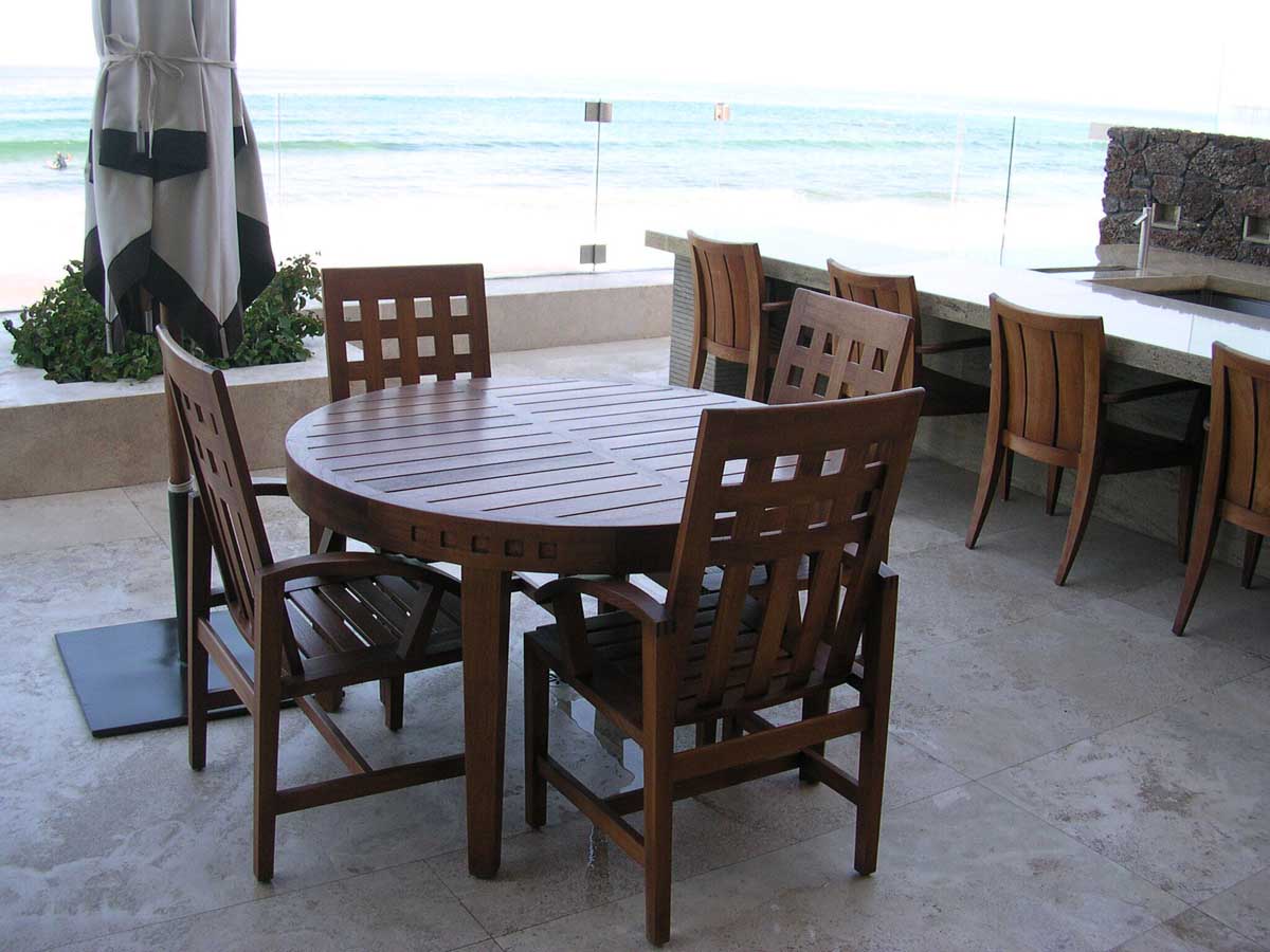 Terrace with teak dining and ocean view