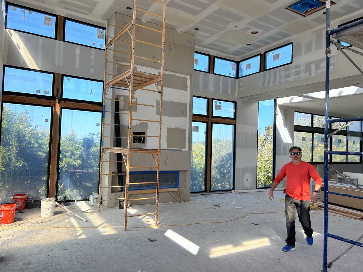 Great room framing with windows and fireplace
