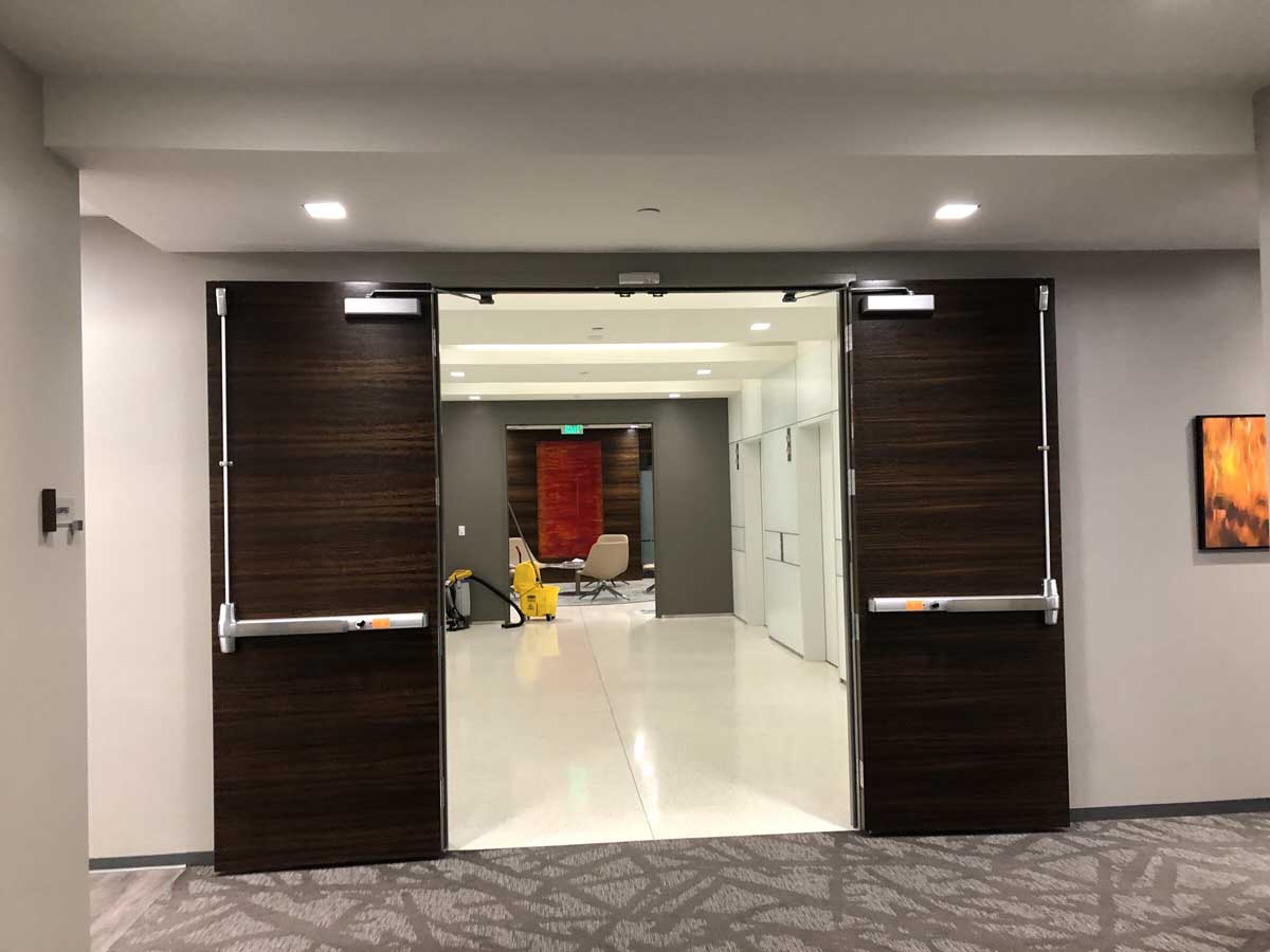 Walnut entry doors to office suite